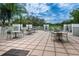 Outdoor patio seating with scenic views, perfect for relaxation and enjoying the beautiful surroundings at 1516 E Lake Woodlands Pkwy, Oldsmar, FL 34677