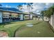 Enjoy outdoor fun with a putting green, clubhouse access, lounging, and entertainment options in a green, relaxing setting at 1516 E Lake Woodlands Pkwy, Oldsmar, FL 34677