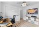 Functional office space with a whiteboard, desk, and storage for a productive work environment at 1562 Coastal Pl, Dunedin, FL 34698