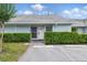 Charming single-story home featuring a well-maintained lawn and a cozy, inviting entrance at 16109 Rambling Vine E Dr, Tampa, FL 33624