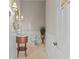 Powder room with elegant mirror, custom vanity, and stylish fixtures at 17301 Ladera Estates Blvd, Lutz, FL 33548