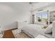 Charming bedroom with built-in shelving and bench seating under a large window at 17301 Ladera Estates Blvd, Lutz, FL 33548