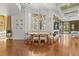 Bright dining room with hardwood floors and views from large bay window at 17301 Ladera Estates Blvd, Lutz, FL 33548