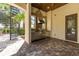 Outdoor kitchen with stainless steel appliances and decorative tile backsplash at 17301 Ladera Estates Blvd, Lutz, FL 33548