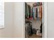 Walk-in closet with wire shelving and hanging clothes at 180 Rotonda N Blvd, Rotonda West, FL 33947