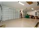 Spacious three car garage with epoxy floors and plenty of storage at 180 Rotonda N Blvd, Rotonda West, FL 33947