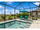 Sparkling pool with screened enclosure offers serene relaxation and outdoor enjoyment at 180 Rotonda N Blvd, Rotonda West, FL 33947