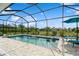 Sparkling pool with screened enclosure offers serene relaxation and outdoor enjoyment at 180 Rotonda N Blvd, Rotonda West, FL 33947