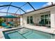 Sparkling pool with screened enclosure offers serene relaxation and outdoor enjoyment at 180 Rotonda N Blvd, Rotonda West, FL 33947