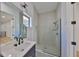Modern bathroom features a glass shower and vanity sink at 1801 N Morgan St # 5, Tampa, FL 33602