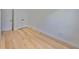 Bright bedroom features wood floors and white doors at 1801 N Morgan St # 5, Tampa, FL 33602