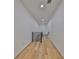 Hallway features wood floors and a modern railing at 1801 N Morgan St # 5, Tampa, FL 33602