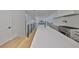 Contemporary kitchen featuring a large island with white countertops, stainless steel gas range, and sleek black faucet at 1801 N Morgan St # 5, Tampa, FL 33602