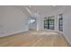 Bright living room with modern hardwood floors, large windows, and plenty of natural light at 1801 N Morgan St # 5, Tampa, FL 33602