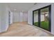 Spacious living room features wood floors and glass doors at 1801 N Morgan St # 5, Tampa, FL 33602