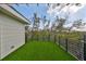 Outdoor patio features artificial grass and metal railing at 1801 N Morgan St # 5, Tampa, FL 33602