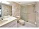 Bathroom with shower, vanity, and toilet at 2593 Countryside Blvd # 7305, Clearwater, FL 33761