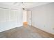 Bedroom with a ceiling fan and a closet at 2593 Countryside Blvd # 7305, Clearwater, FL 33761