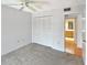 Bedroom with a closet and view to bathroom at 2593 Countryside Blvd # 7305, Clearwater, FL 33761