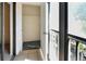 Hallway leading to a carpeted storage closet, providing extra space at 2593 Countryside Blvd # 7305, Clearwater, FL 33761