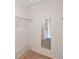 Walk in closet with built in storage racks at 2593 Countryside Blvd # 7305, Clearwater, FL 33761