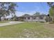 Charming single-story home with well maintained lawn and solar panels at 2704 Dorene Dr, Plant City, FL 33563