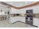 Beautiful kitchen featuring stainless steel appliances, tile backsplash, and light colored countertops at 2704 Dorene Dr, Plant City, FL 33563