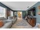 Inviting living room with comfortable seating, stylish decor, and neutral colors at 2704 Dorene Dr, Plant City, FL 33563