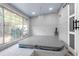Spa room showcasing a hot tub, tiled walls, and large windows for natural light at 2704 Dorene Dr, Plant City, FL 33563