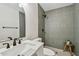 Modern bathroom featuring a glass enclosed shower with a rainfall showerhead at 2742 Wilson Ct, Palm Harbor, FL 34684