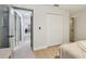 Bedroom showcasing a closet and doorway to a hallway at 2742 Wilson Ct, Palm Harbor, FL 34684