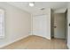 Clean, light-filled bedroom with ample closet space and modern flooring at 2742 Wilson Ct, Palm Harbor, FL 34684
