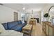 Bright and airy living room featuring modern decor, comfortable seating, and an open layout at 2742 Wilson Ct, Palm Harbor, FL 34684