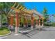 Community car wash station with multiple bays, vacuums, and covered parking spots at 2773 Via Cipriani # 1310A, Clearwater, FL 33764