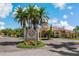 Beautiful entrance to Grand Bellagio featuring manicured gardens and elegant architecture at 2773 Via Cipriani # 1310A, Clearwater, FL 33764