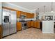Modern kitchen featuring stainless steel appliances, granite countertops, and ample cabinet space at 2773 Via Cipriani # 1310A, Clearwater, FL 33764