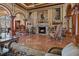 Elegant lobby area with marble floors, ornate columns, decorative paintings, and classic furniture at 2773 Via Cipriani # 1310A, Clearwater, FL 33764