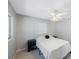 Bedroom featuring a bed, ceiling fan, and a window providing natural light at 3215 58Th N St, St Petersburg, FL 33710