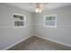 Clean bedroom with neutral paint and plenty of natural light at 3215 58Th N St, St Petersburg, FL 33710