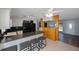 Open-concept kitchen with breakfast bar and modern appliances at 3215 58Th N St, St Petersburg, FL 33710