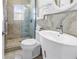 Modern bathroom with walk-in shower, unique vessel sink, and stylish fixtures at 356 20Th Ne Ave, St Petersburg, FL 33704
