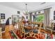 Elegant dining room featuring a chandelier, wood floors, and a large window with natural light at 356 20Th Ne Ave, St Petersburg, FL 33704