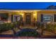 Inviting front entrance featuring decorative iron railings, stone walkway, and elegant lighting at 356 20Th Ne Ave, St Petersburg, FL 33704
