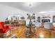 Open layout of the living room, dining area, and fireplace creating a welcoming space at 356 20Th Ne Ave, St Petersburg, FL 33704