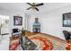 This living room features hardwood floors, an area rug, and a flat screen TV at 356 20Th Ne Ave, St Petersburg, FL 33704
