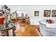 Open concept living and dining area featuring hardwood floors and elegant decor at 356 20Th Ne Ave, St Petersburg, FL 33704