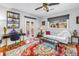 Living room with french doors leading to patio, hardwood floors, and a decorative rug at 356 20Th Ne Ave, St Petersburg, FL 33704