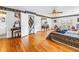 Spacious main bedroom with hardwood floors, and a sitting area with lots of natural light at 356 20Th Ne Ave, St Petersburg, FL 33704