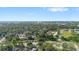 Expansive aerial view of the neighborhood showcasing tree-lined streets and residences at 3709 Danny Bryan Blvd, Tampa, FL 33619