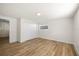 Bedroom with a closet, hardwood floors, and natural light from a window, offering a cozy and functional space at 3709 Danny Bryan Blvd, Tampa, FL 33619